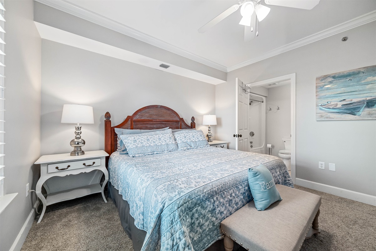 Light and airy bedroom with a classic white palette and elegant furnishings, creating a calming atmosphere.