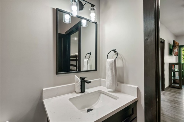 Lower-level half bathroom for added convenience.