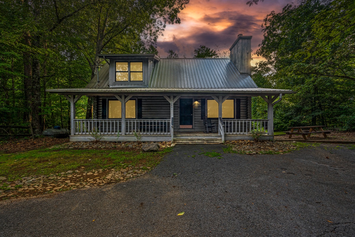 A welcoming porch and breathtaking sunset.