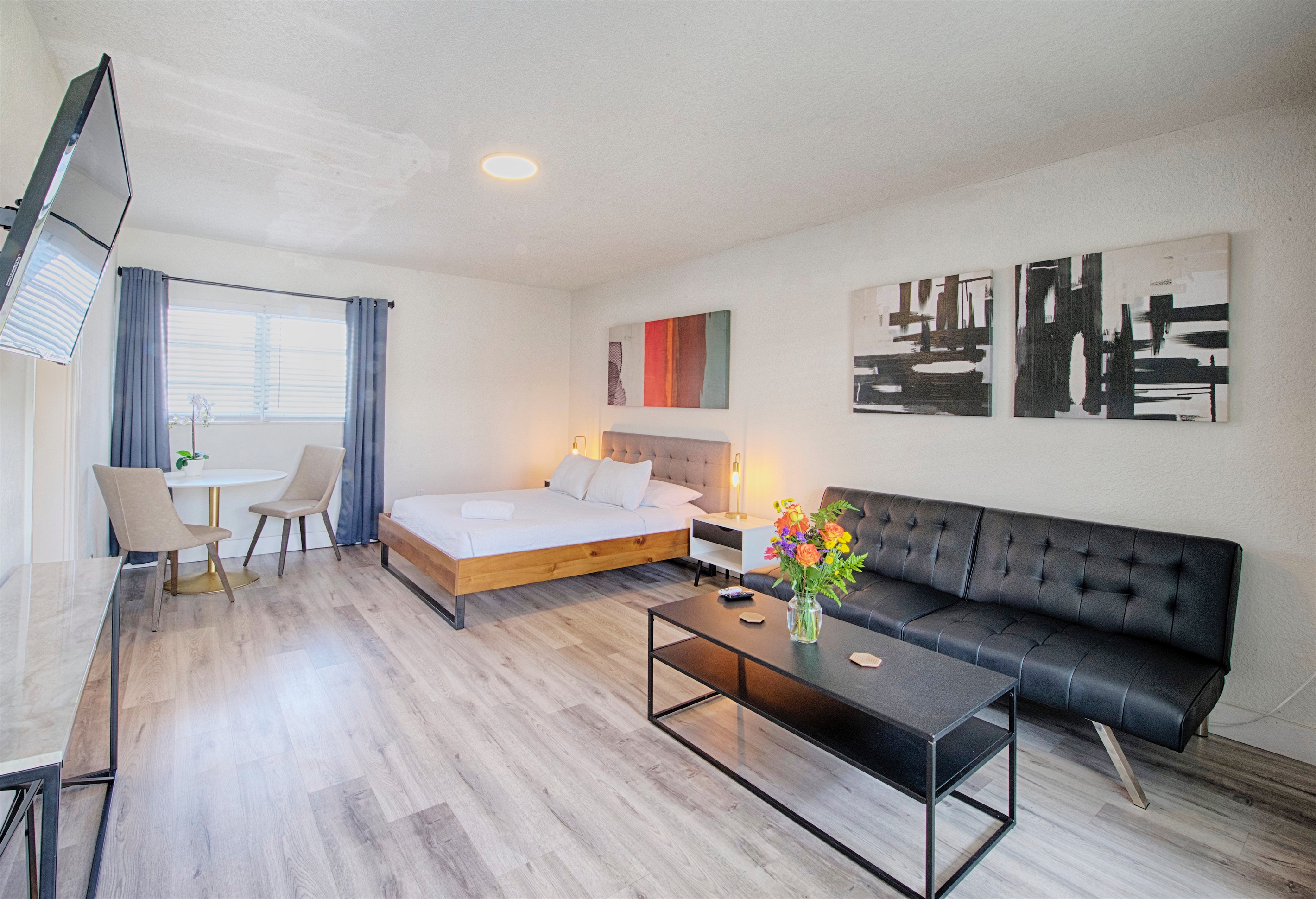 Welcome to your studio at Pier Walk! Plush dining chair and love seat futon provides multiple seating options