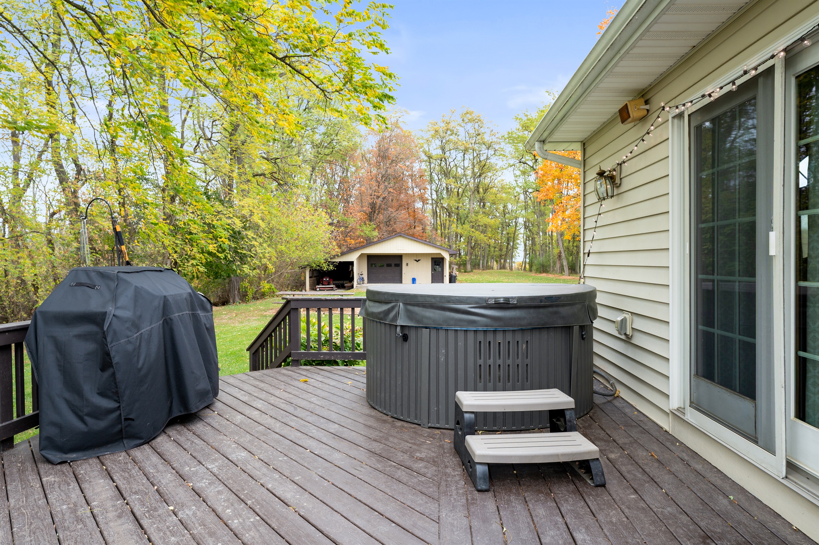 Private deck with a relaxing hot tub — soak under the stars and let your stress melt away.