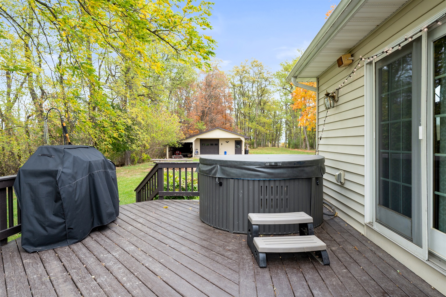 Private deck with a relaxing hot tub — soak under the stars and let your stress melt away.