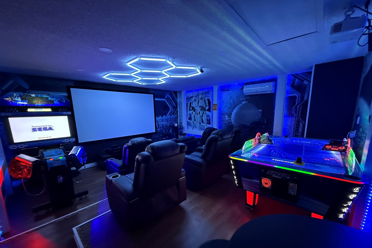 🌌🎮 Level up your escape in our Star Wars movie theater! 150” screen, surround sound, Roku, Bluetooth, and epic arcade games for nonstop galactic fun.