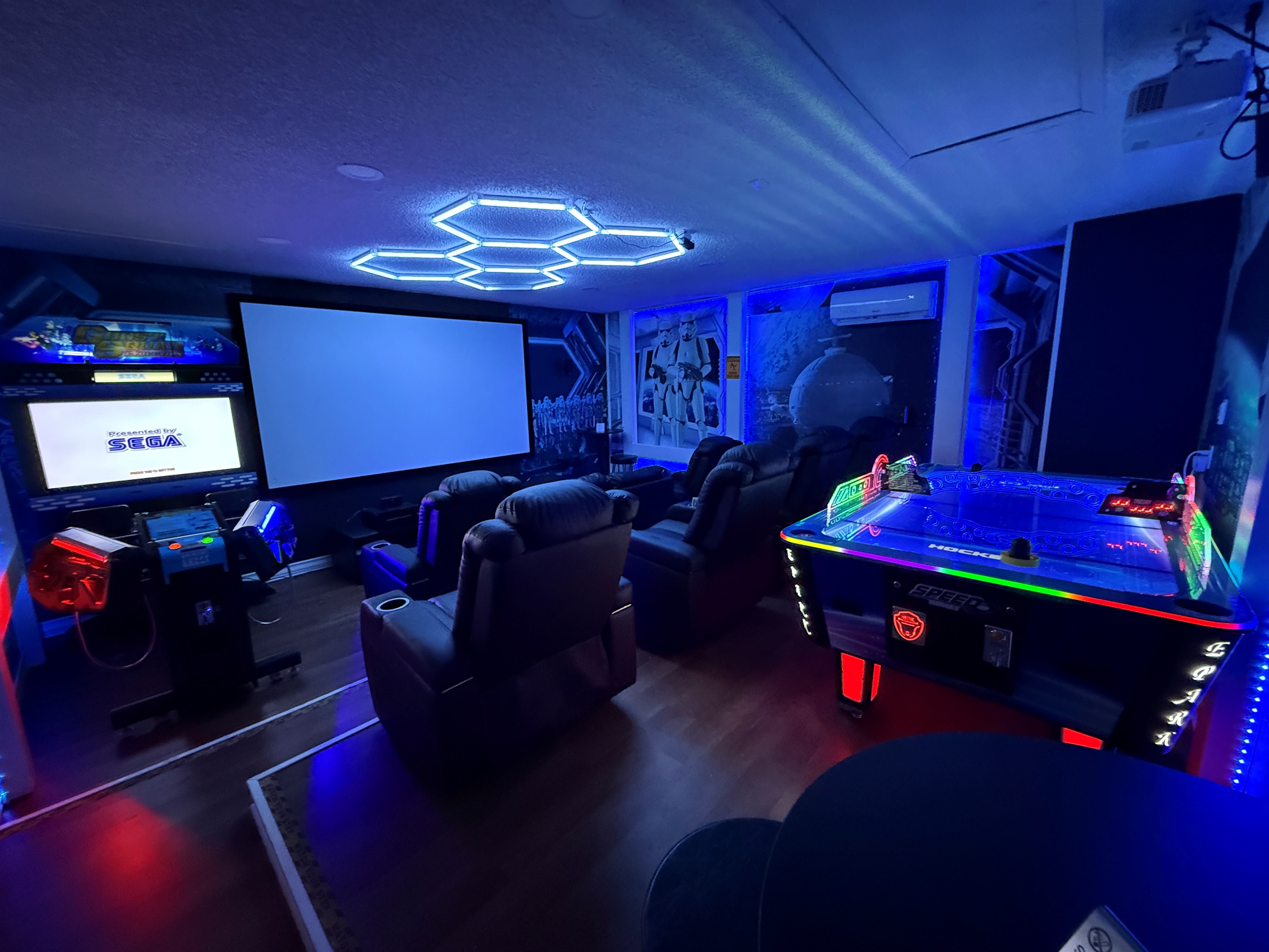 🌌🎮 Level up your escape in our Star Wars movie theater! 150” screen, surround sound, Roku, Bluetooth, and epic arcade games for nonstop galactic fun.