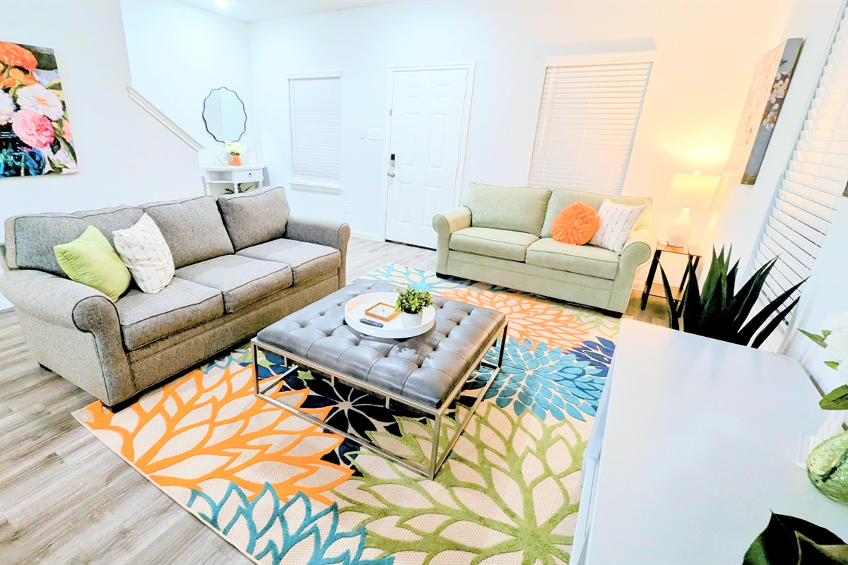 Comfortable living room with plenty of seating options.