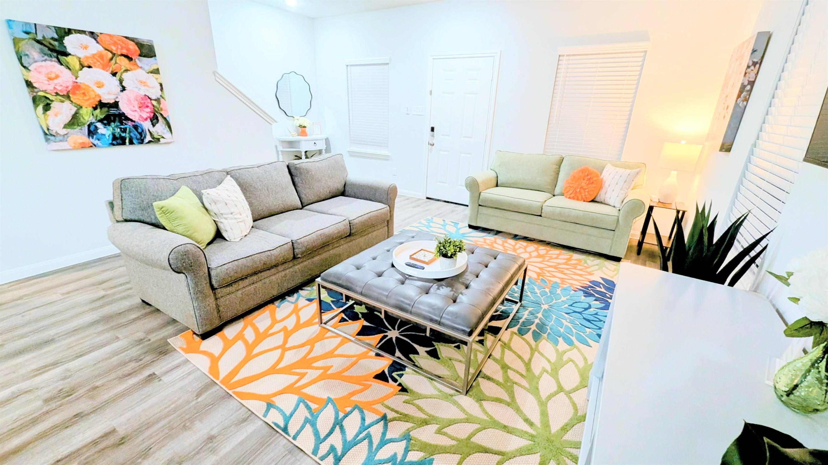 Comfortable living room with plenty of seating options.