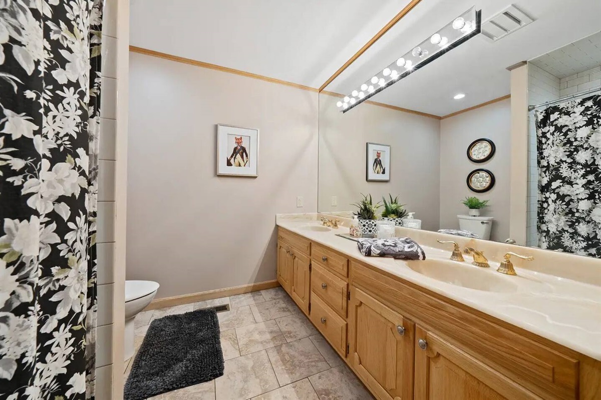 Shared downstairs full bath.