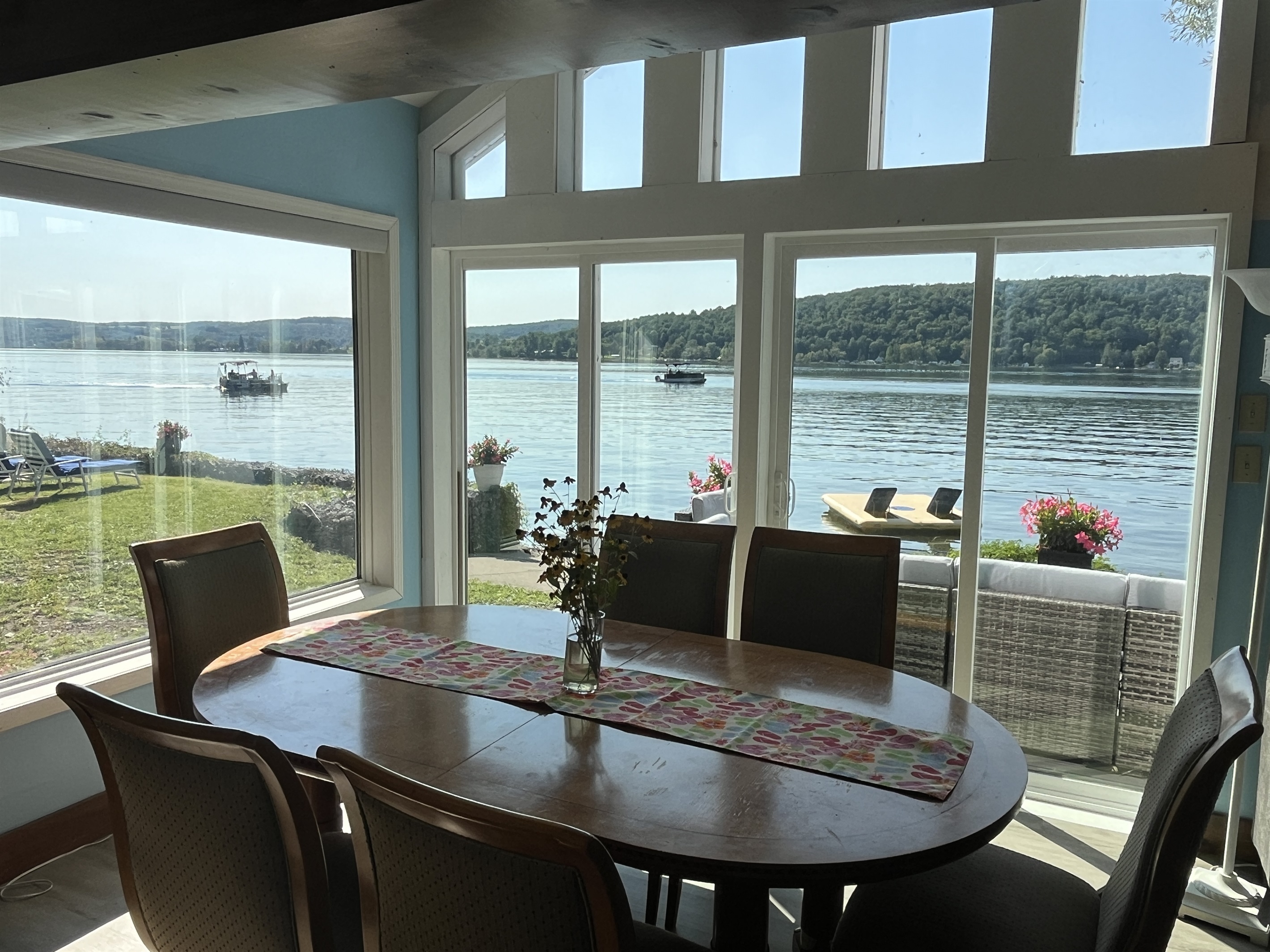 Bright and beautiful dining room overlooking the water