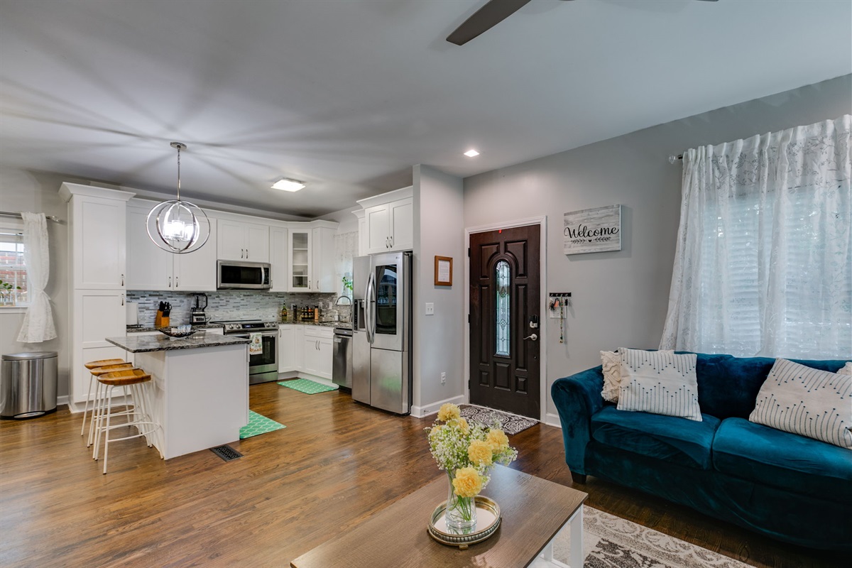 Open-concept living at its best — cook in the fully stocked kitchen while staying connected with friends and family in the cozy living area. Perfect for sharing meals, conversations, and memorable moments all in one inviting space.