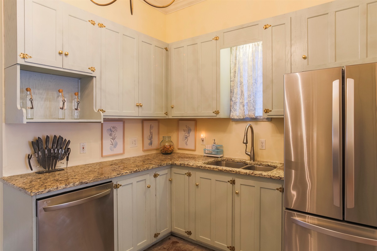 Bright and functional, this kitchen is stocked with everything you need for a comfortable stay.