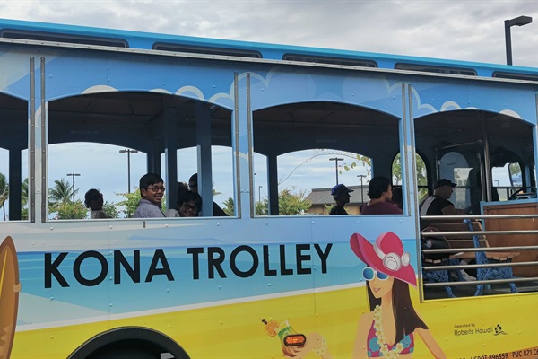 Take the free shuttle (runs every hour from Long's Drugs) from Keauhou Shopping Center to Kona Downtown, Target etc.