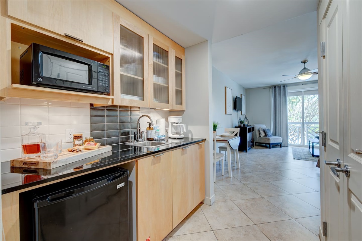 The kitchenette come equipped with a beverage fridge, microwave, both traditional and Keurig coffee makers, drinking glasses, plates, silverware, etc