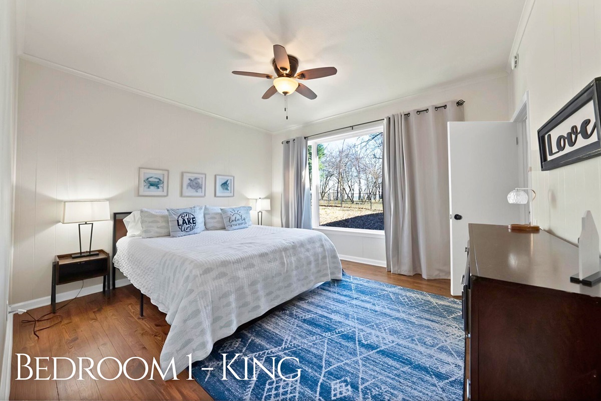 A comfy king bed and calm, cozy vibes for the best kind of sleep.