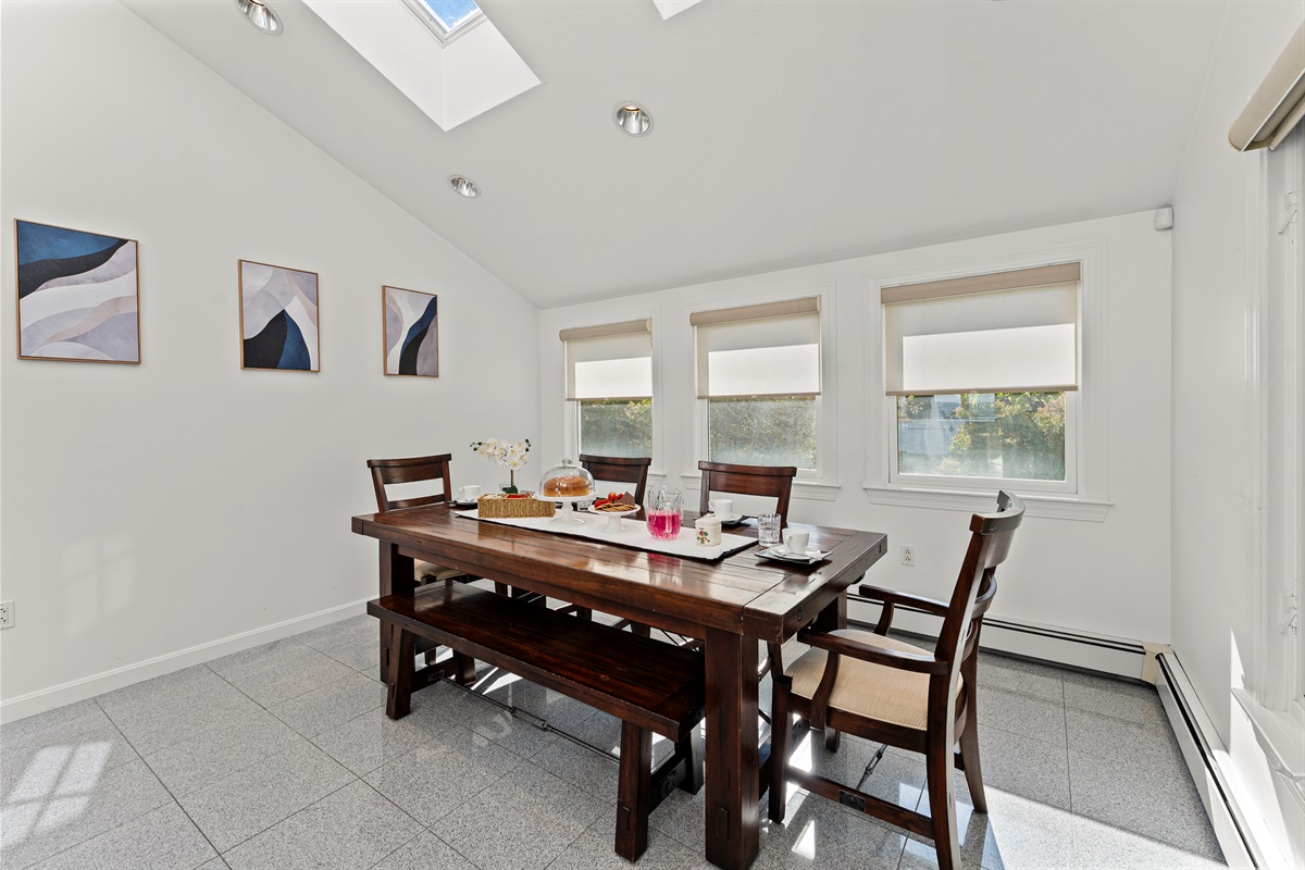 A cheerful dining area with plenty of natural light.