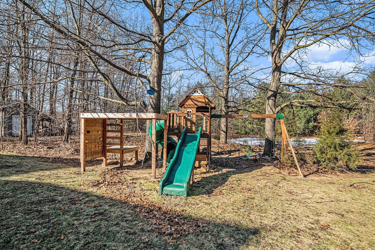 Little ones will love their own outdoor adventure—slides, swings, and room to roam.