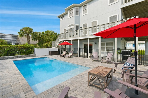 Spend the day poolside, soaking up sunshine while palm trees sway in the coastal breeze
