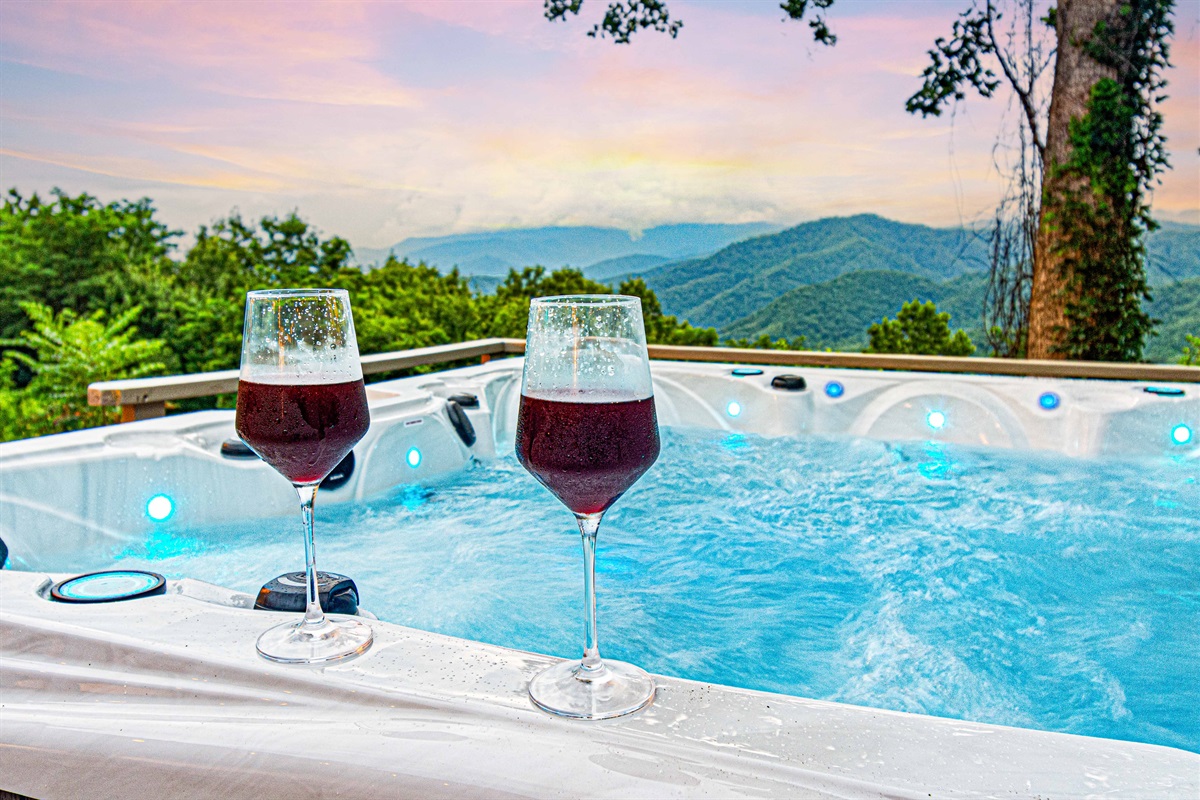 Hot Tub Oasis: Savor stunning mountain views while relaxing in a sparkling hot tub with your drink!