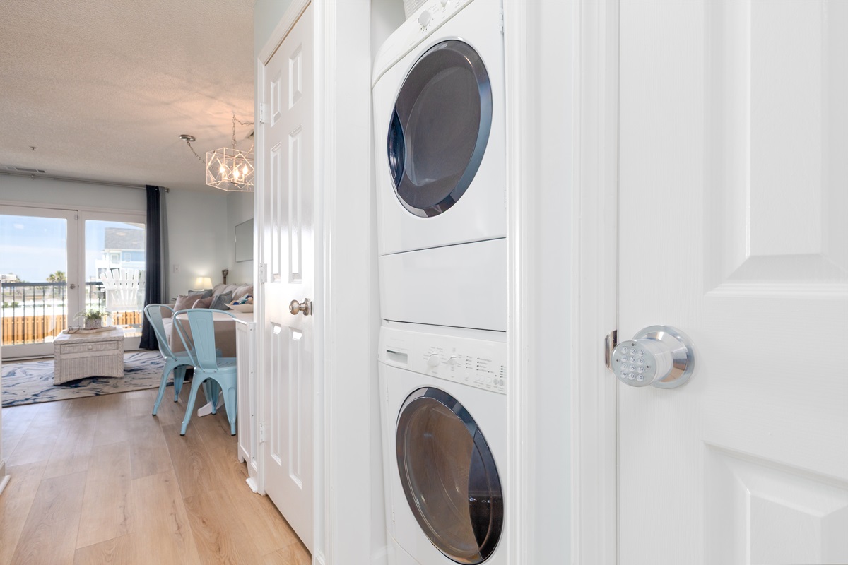 Modern stacked washer and dryer, seamlessly integrated.