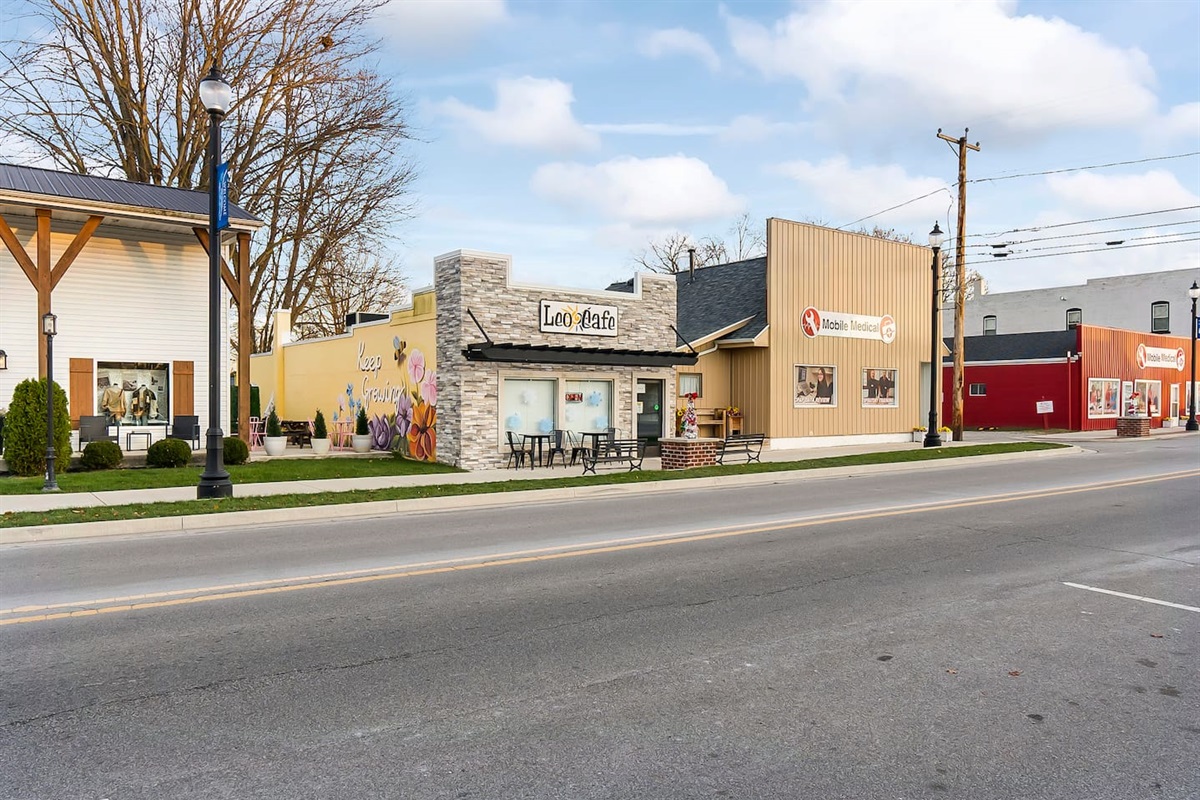 Leo Café and local businesses just around the corner, adding small-town charm.