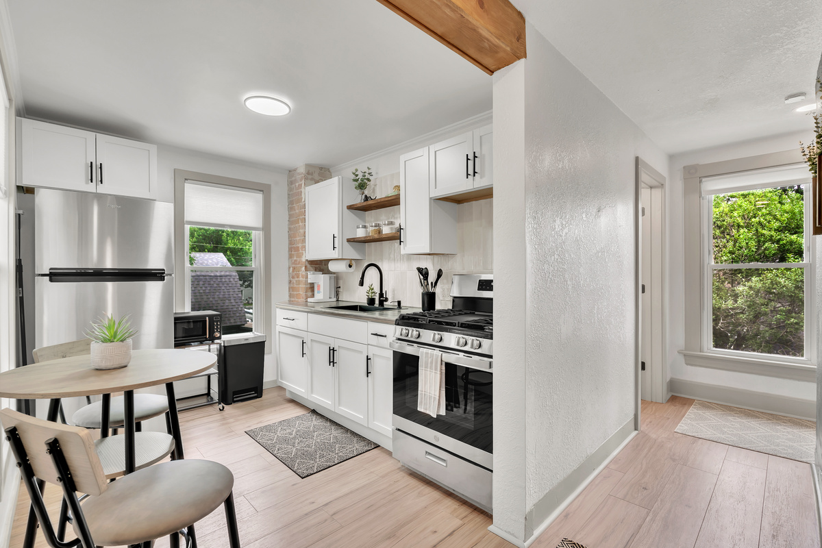 Fully stocked kitchen and entryway from the upper door. Easy and quick access after a long day.
