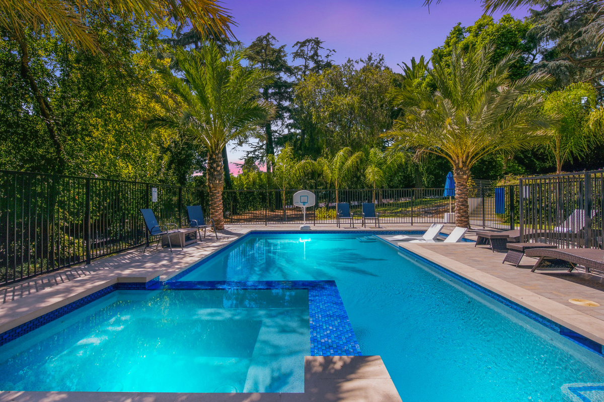 Enjoy a stunning outdoor space with a refreshing pool
