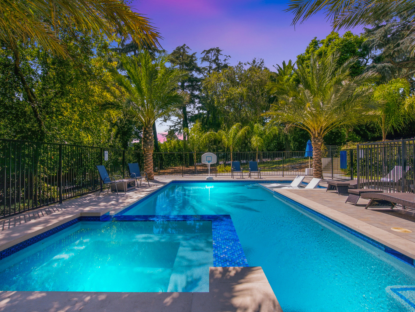 Enjoy a stunning outdoor space with a refreshing pool