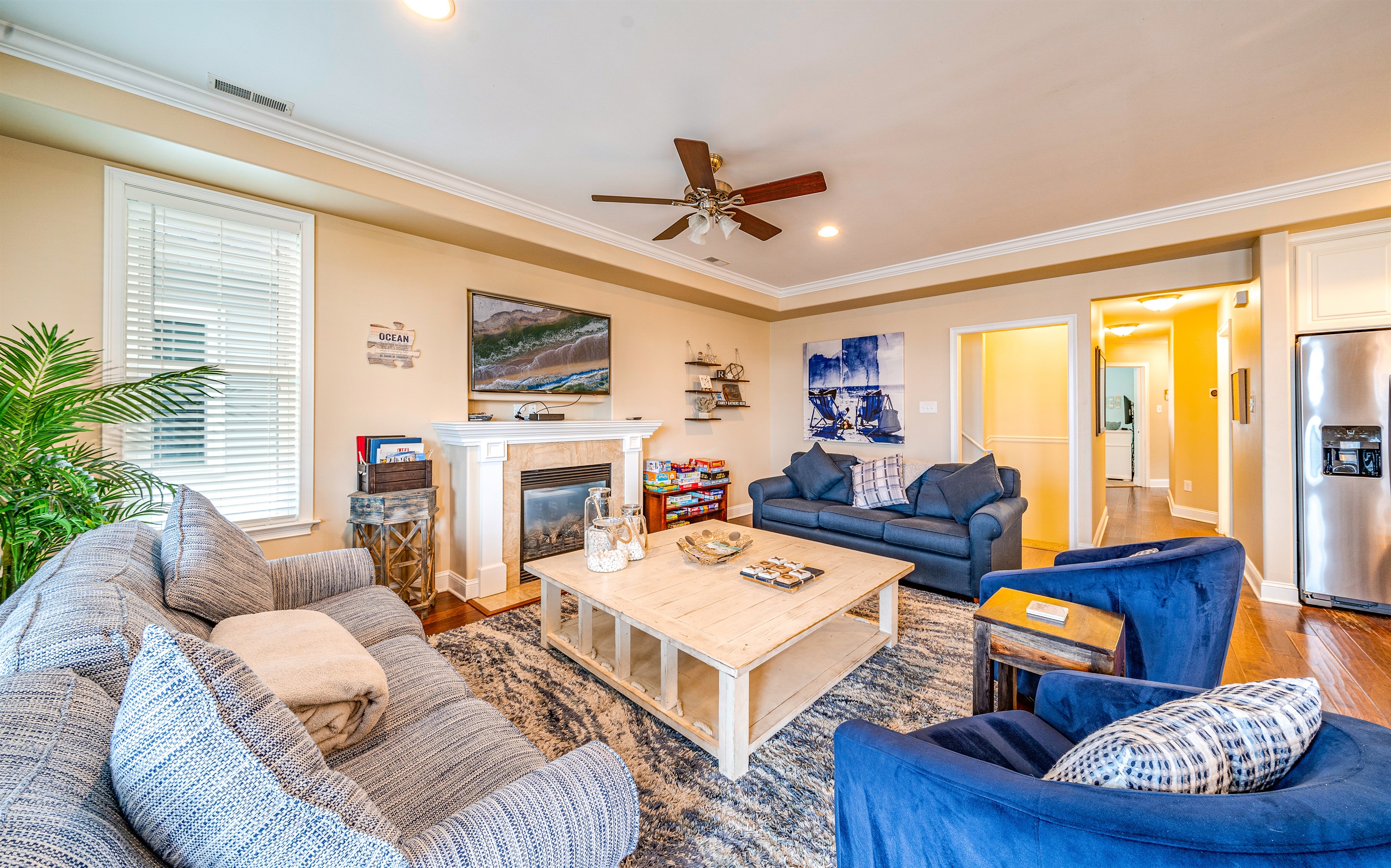 Cozy family room with fireplace and games