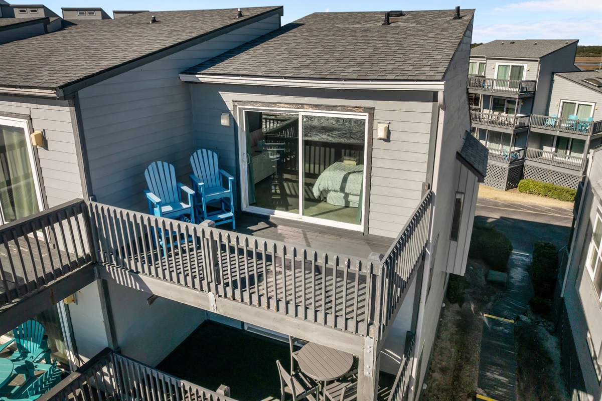 Elevated private balcony off the master bedroom, offering open views and a peaceful outdoor space to enjoy fresh coastal air