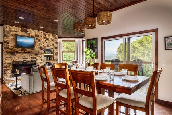 Rustic wood ceilings, stone fireplace, and panoramic views — true Smoky Mountain dining.