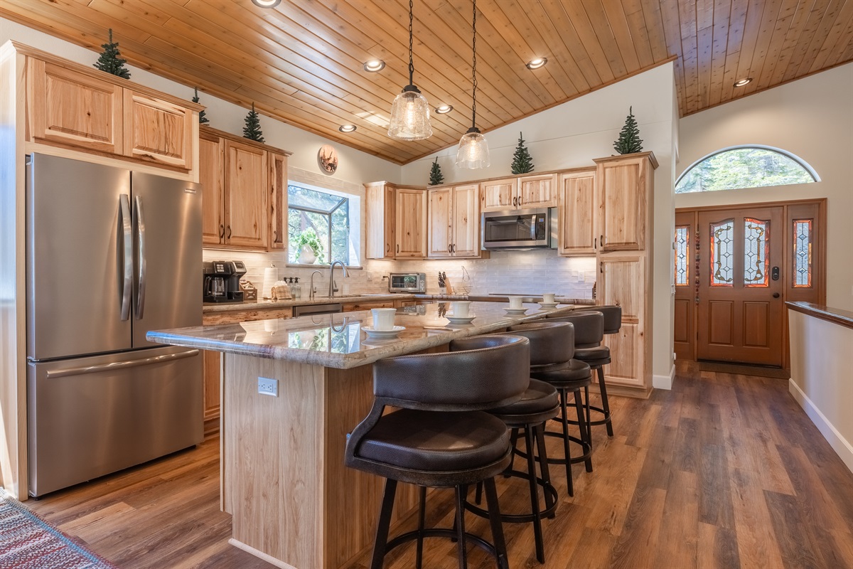 Chef's kitchen also opens to foyer