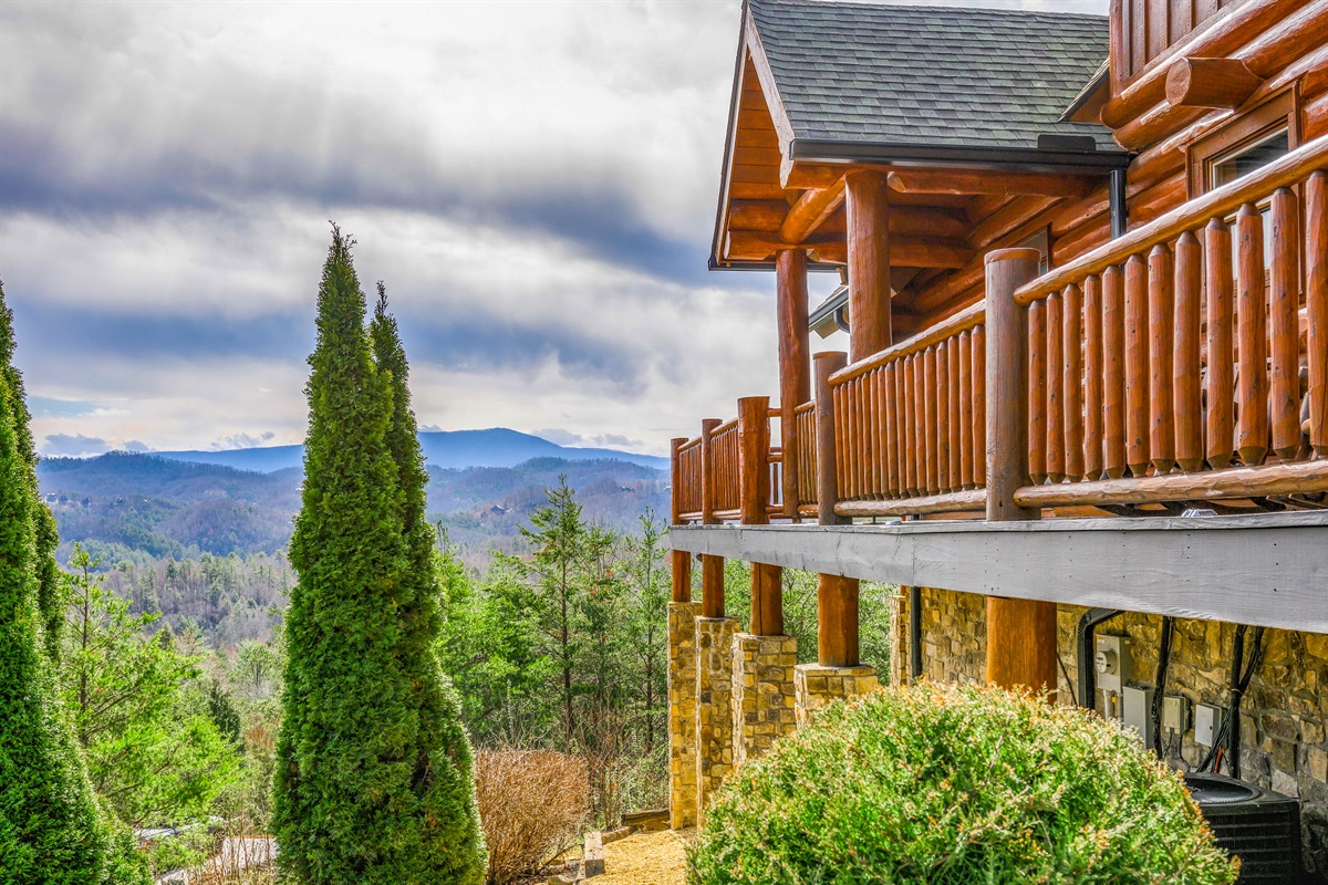 Soak in the beauty of the Great outdoors from this Real Log Cabin with Stunning Views