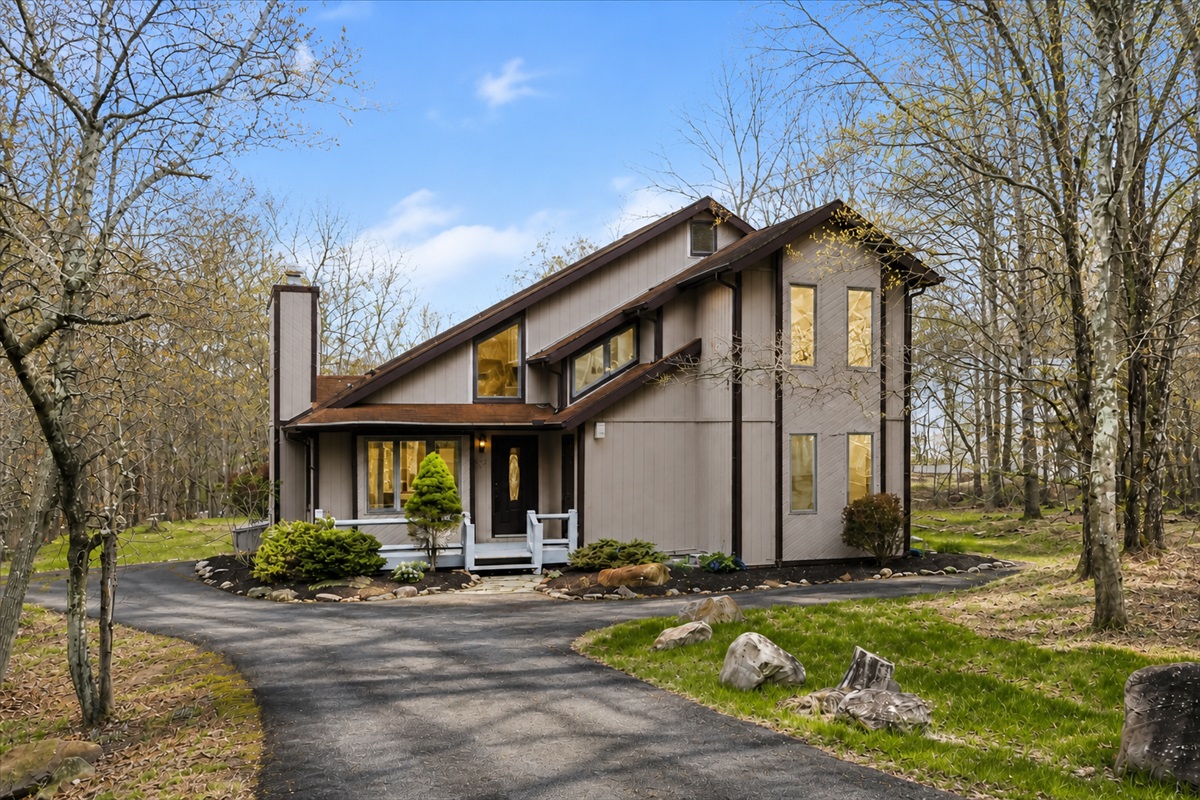Welcome to Coyote Den! A peaceful Pocono retreat surrounded by towering trees and mountain serenity