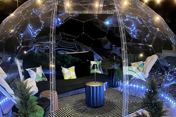 Glamorous Dome Retreat: Stargaze from this charming dome, lit with LED lights and styled as an outdoor room perfect for lounging in any season!