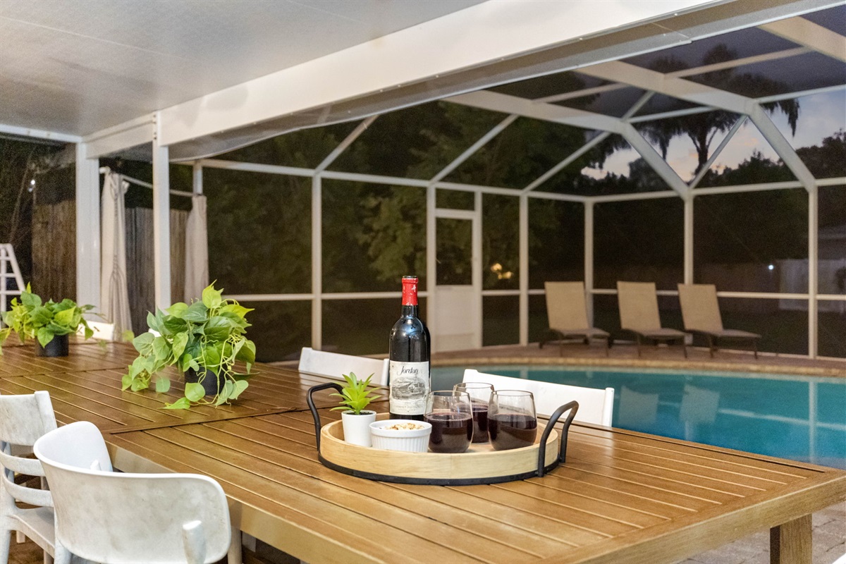 Relax in style with a fully screened outdoor area, providing shade, comfort, and an inviting poolside ambiance.