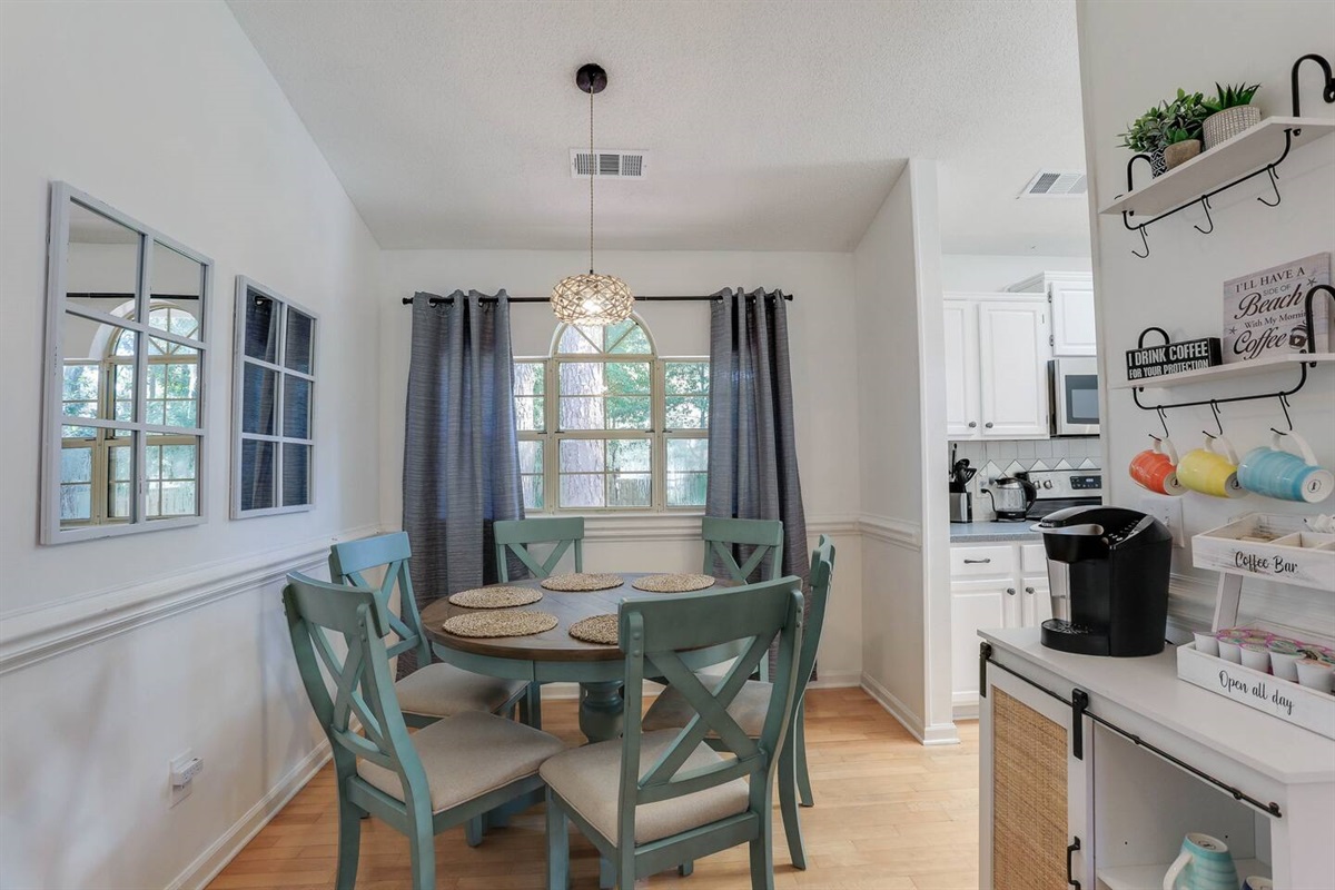 Gather around the dining table with seating for six, perfect for shared meals and memorable conversations.