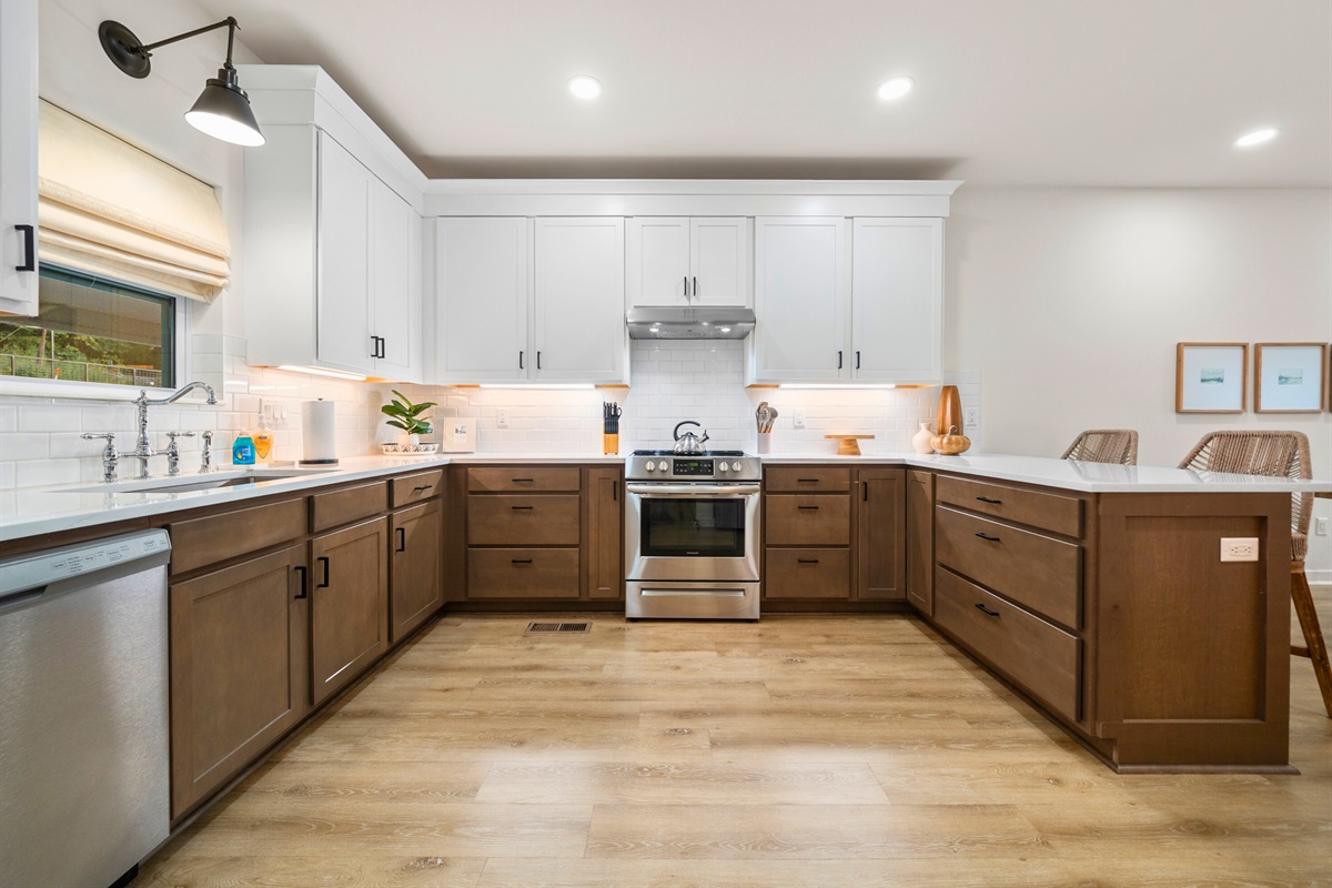 Bright and open kitchen design with sleek finishes, ideal for family meals or entertaining.