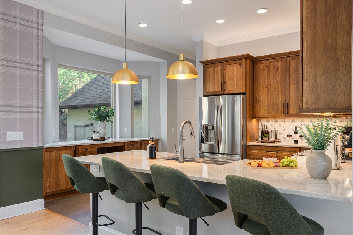 Spacious kitchen island with seating - great for gathering while cooking or enjoying a casual breakfast