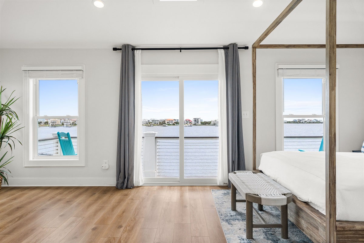Wake up to breathtaking bay views with private balcony access right from the master bedroom