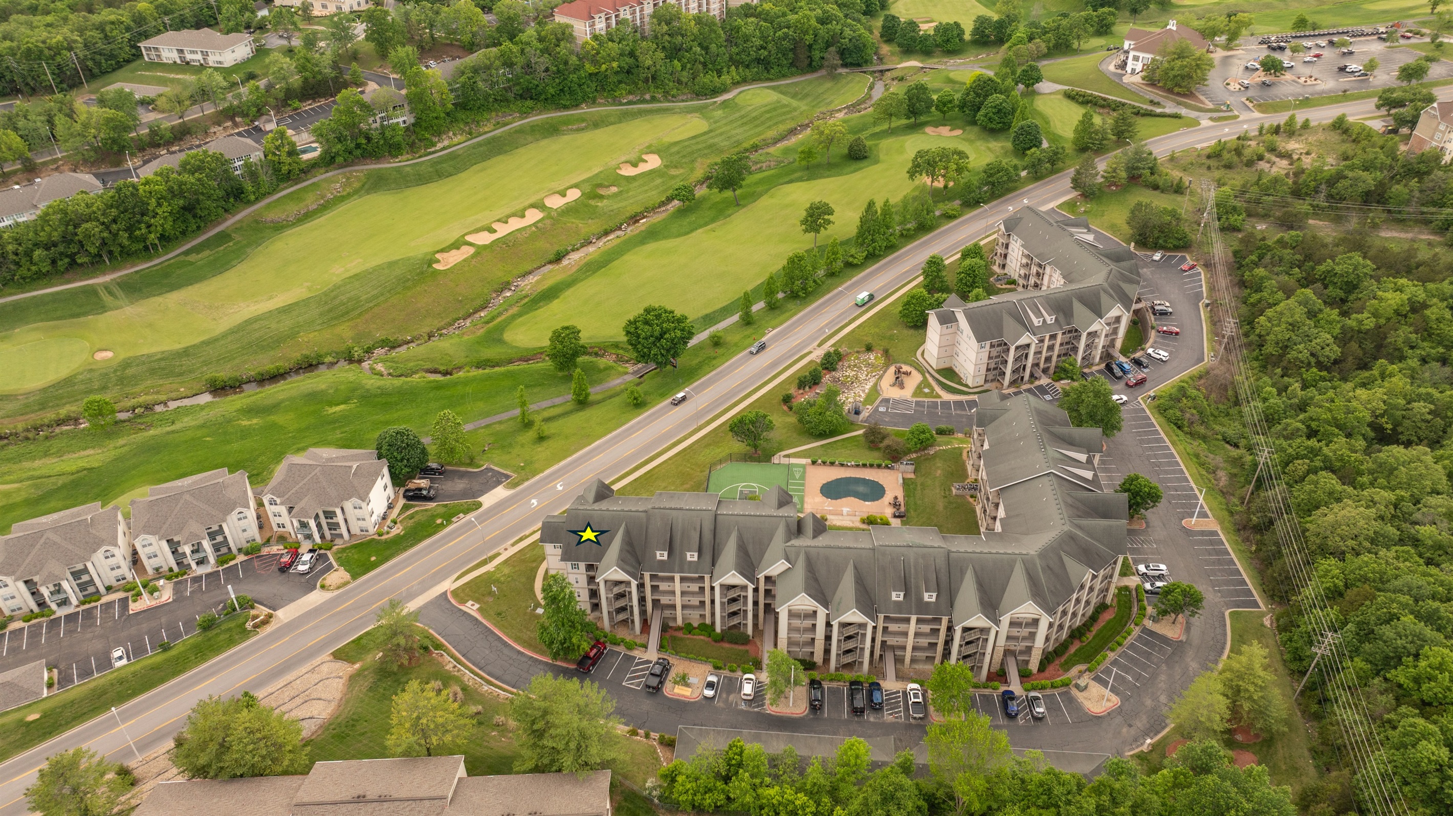 Our condo is in the perfect location! First level with no steps, directly across from Thousand Hills golf course and with the pool and basketball court right behind the unit