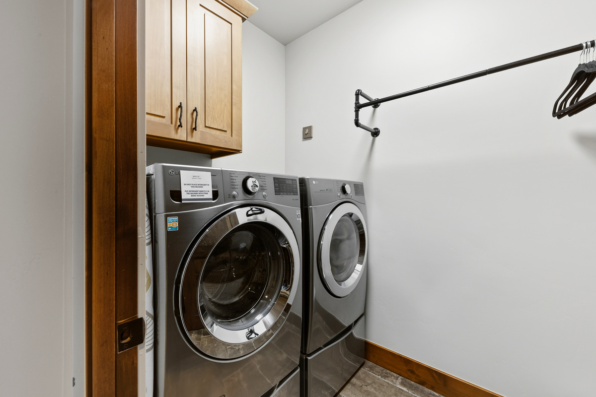 Laundry room with full-size washer and dryer