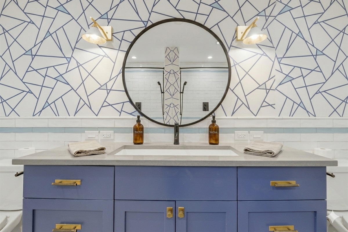 bathroom 1 has soaking tub, storage, beautifully renovated