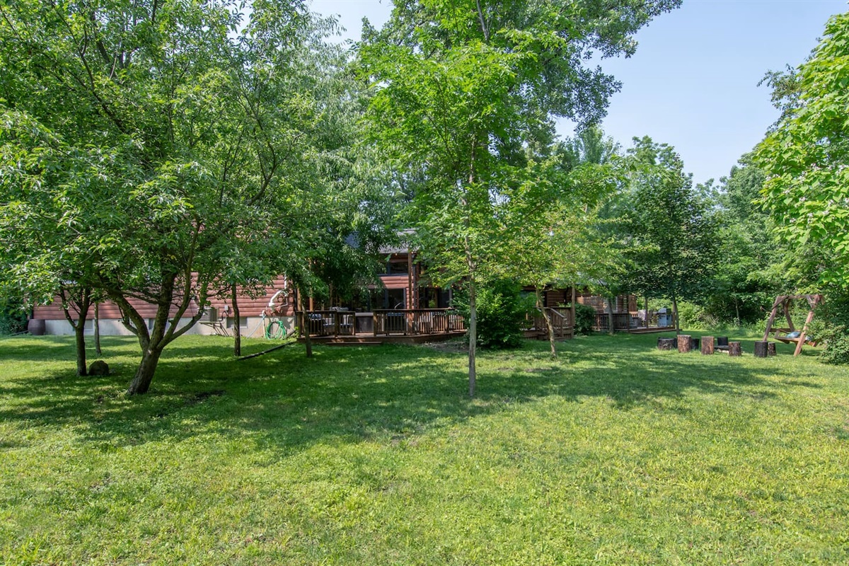The yard has both shaded and sunny areas.