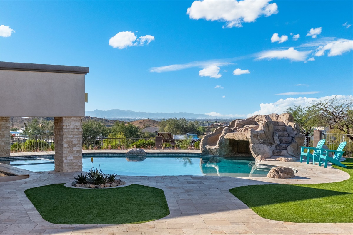 Private pool and spa with rock waterfall feature create a true luxury resort experience right in your backyard