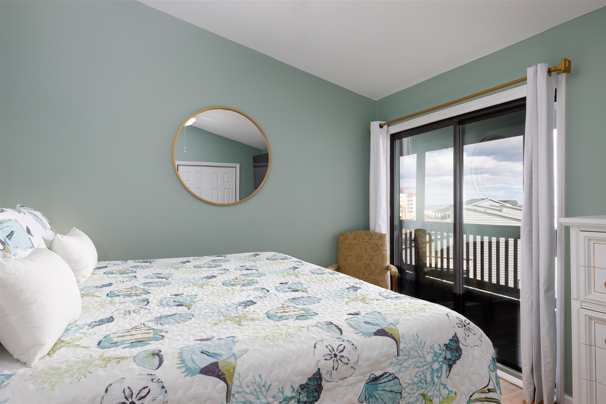 Master bedroom with oceanfront balcony access
