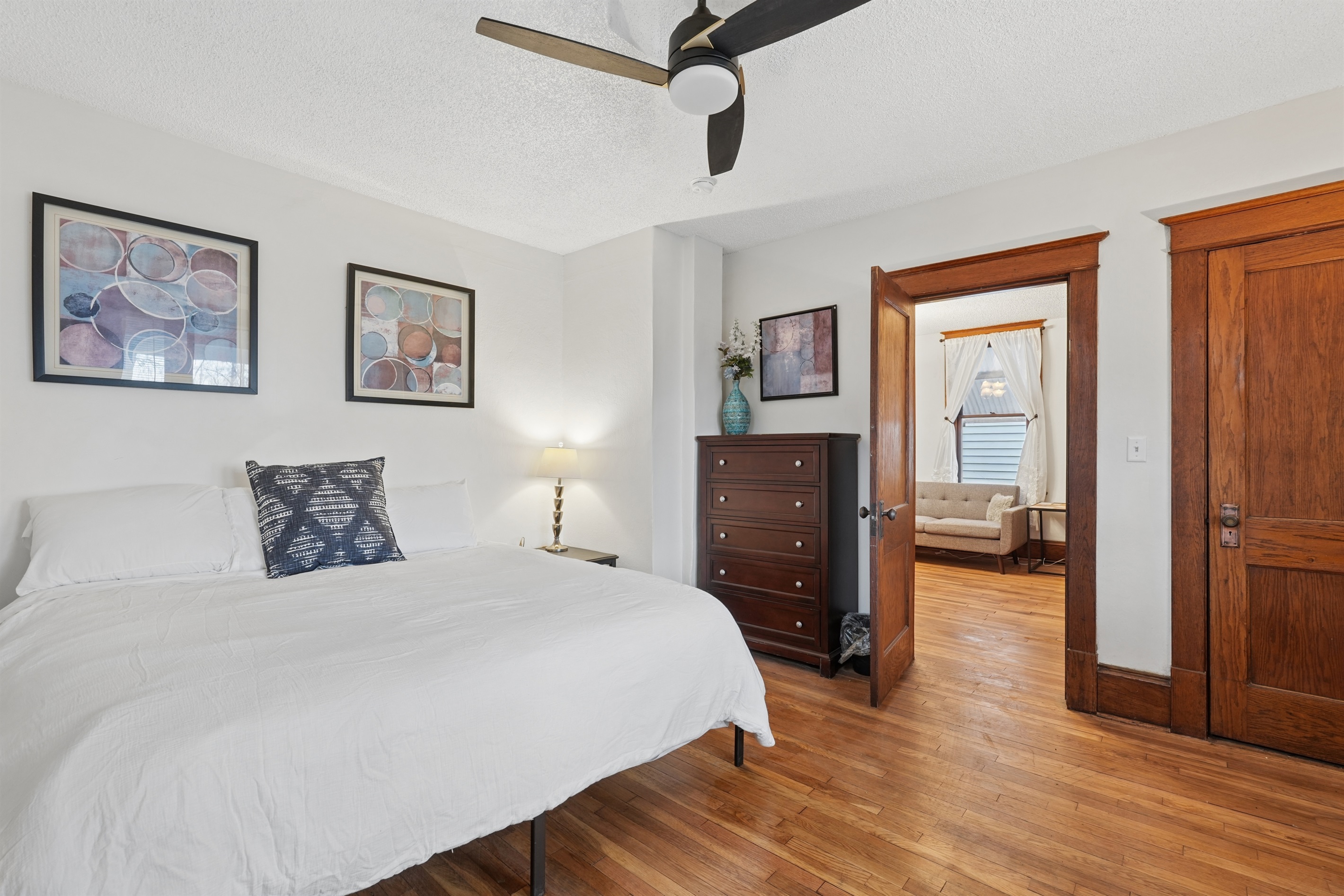 This comfortable king bedroom is right off the living room and overlooks the quiet cul-de-sac.