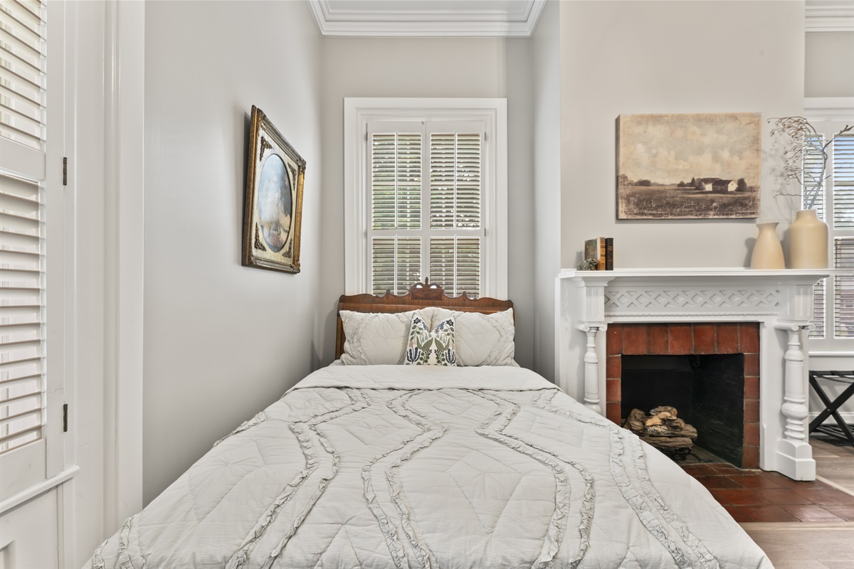 Double bed in family suite.