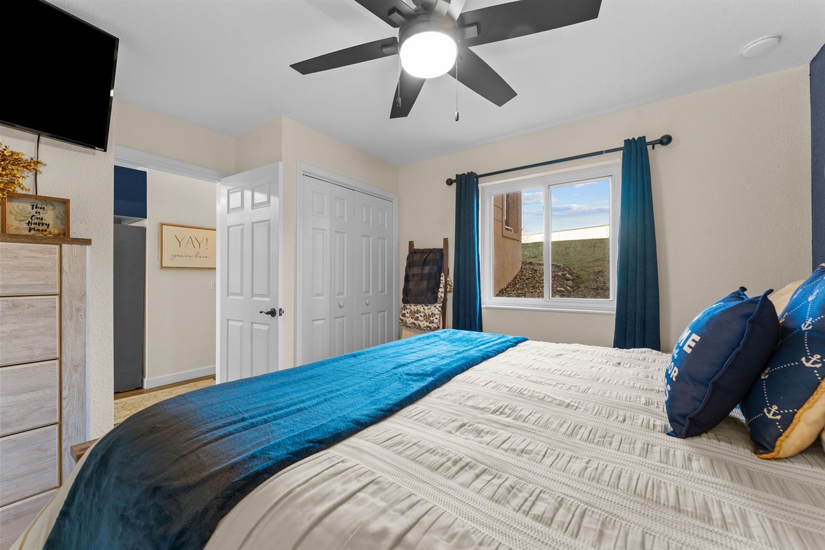 Bright bedroom with natural light and peaceful vibes.