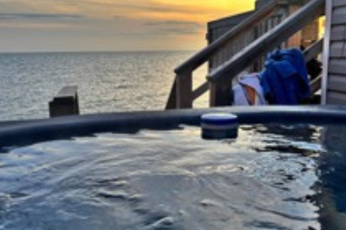 End the day in the hot tub with a front-row sunset view.