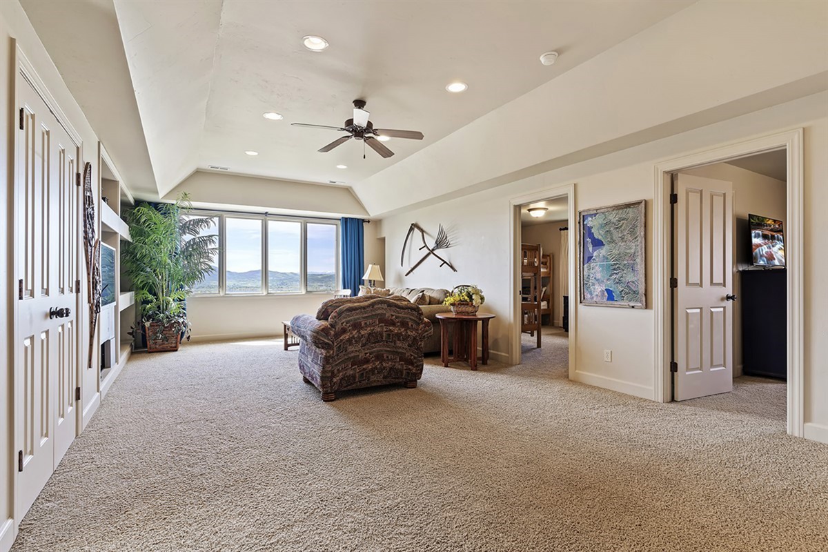 Expansive upstairs living area with plenty of room to relax and enjoy the mountain views.