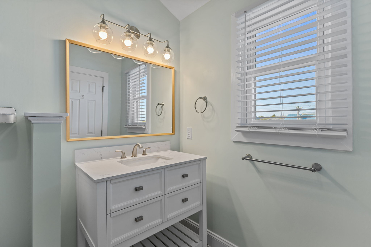 Bright finishes and thoughtful design create a spa-like bathroom you'll look forward to using every day